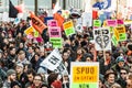 Protesters Holding all kind of Signs, Flags and Placards in the Streets. Royalty Free Stock Photo